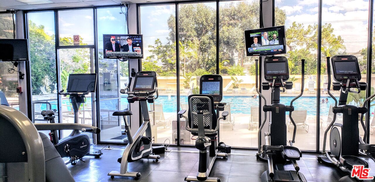 2170 Century Park East, Unit 1807 Los Angeles, CA 90067 - Photo 18 of 30 a view of a room with gym equipment