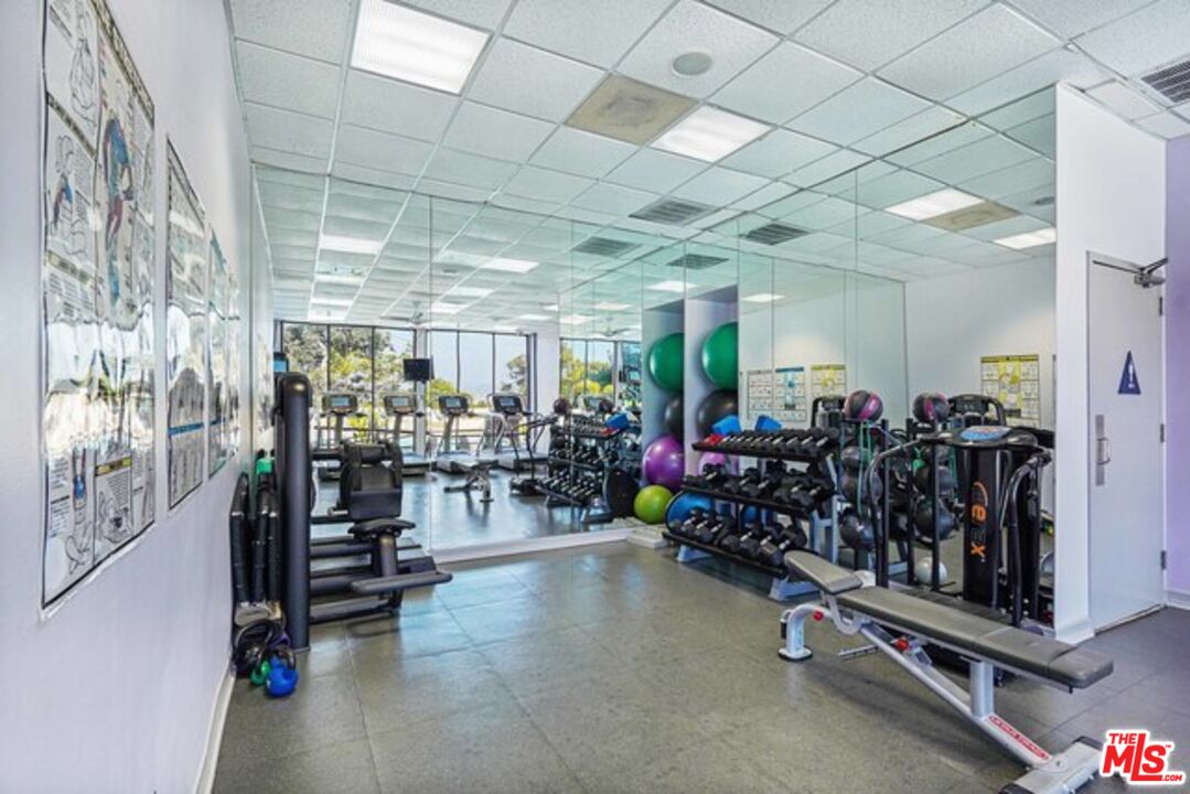 2170 Century Park East, Unit 1807 Los Angeles, CA 90067 - Photo 20 of 30 a view of a room with gym equipment