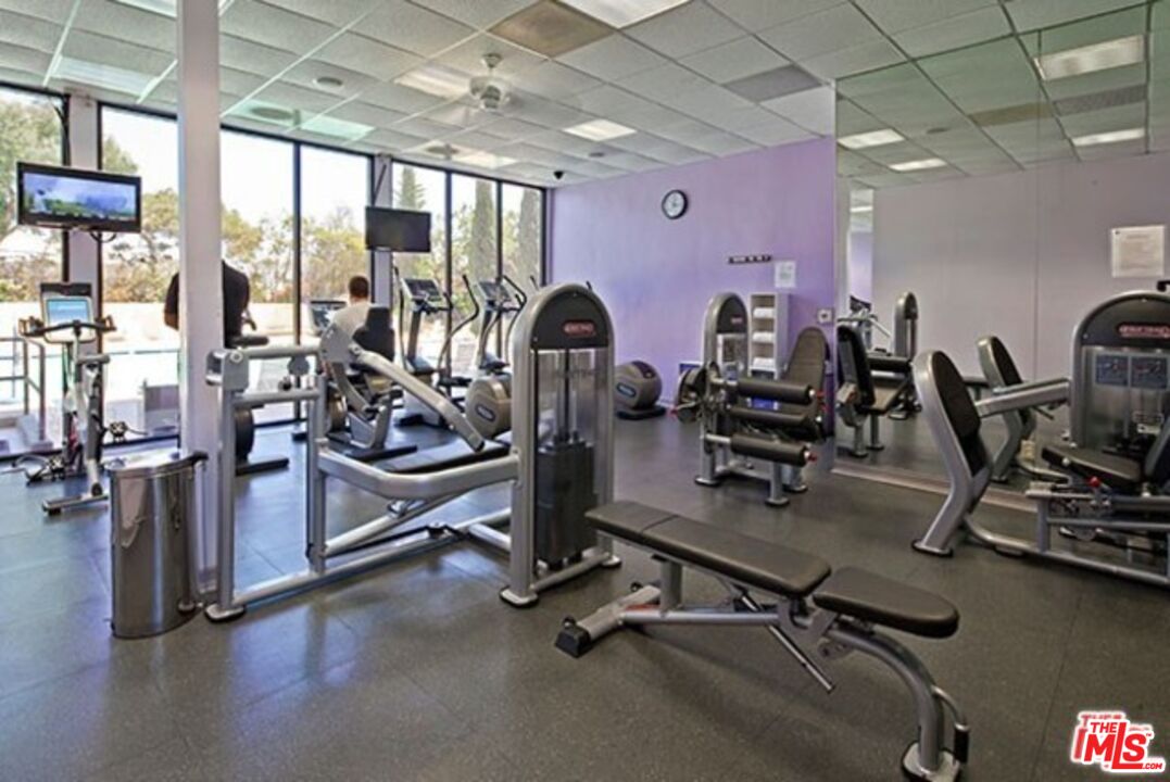2170 Century Park East, Unit 1807 Los Angeles, CA 90067 - Photo 21 of 30 a view of a room with gym equipment
