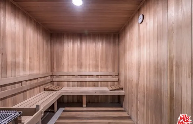 a view of a swimming pool with a yard