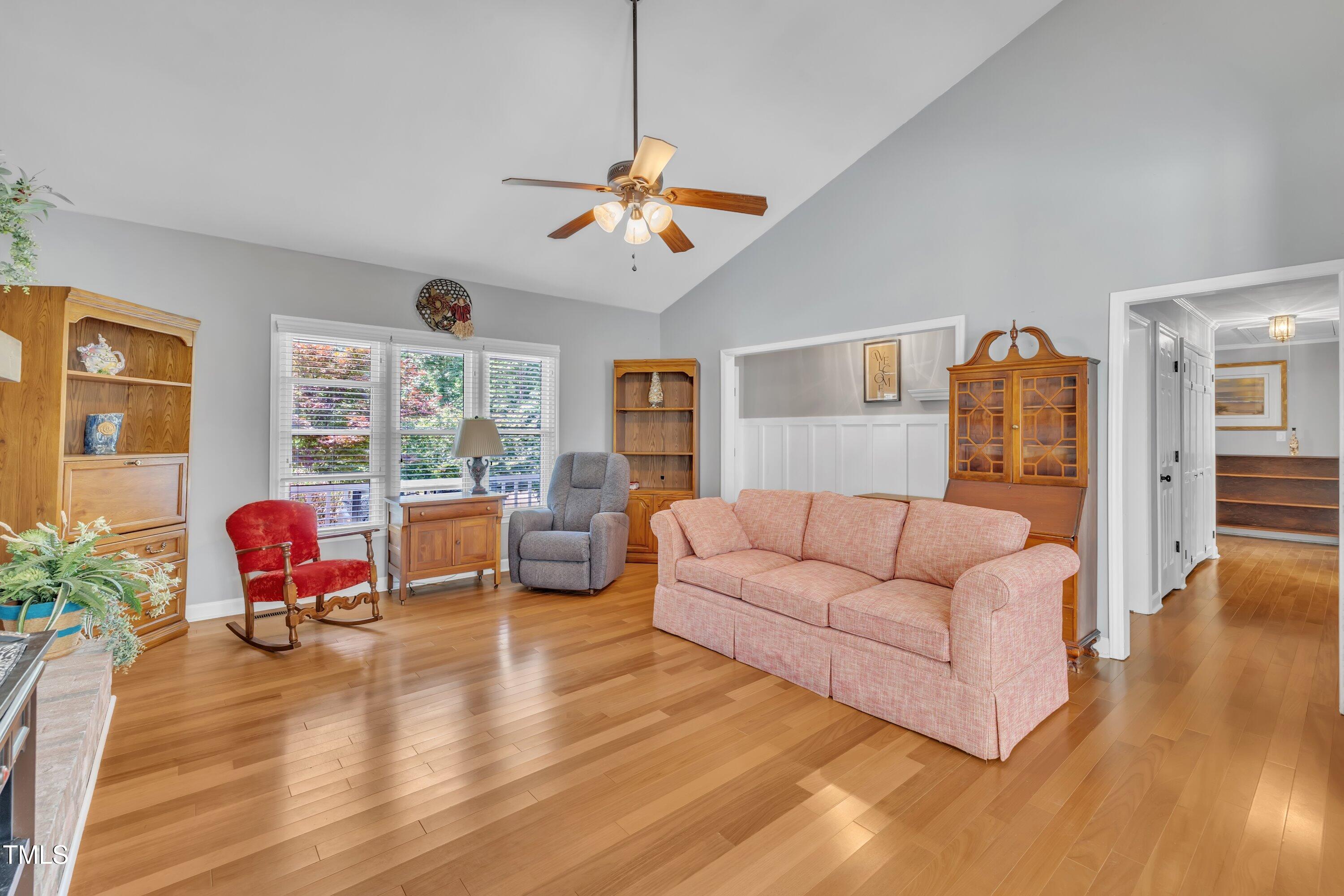 1112 Turner Farms Road Garner, NC 27529 - Photo 11 of 43 a living room with furniture and wooden floor