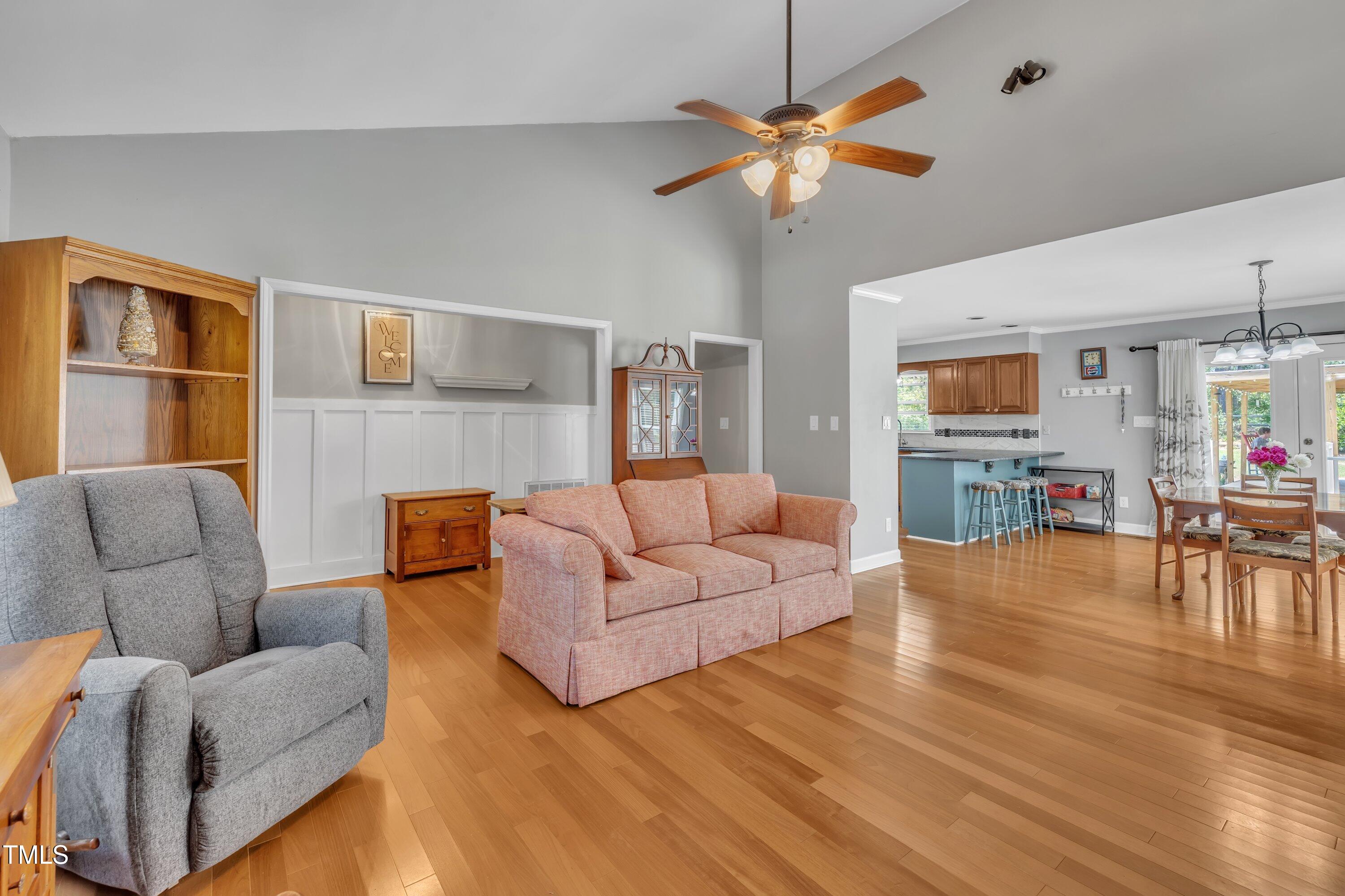 1112 Turner Farms Road Garner, NC 27529 - Photo 12 of 43 a living room with furniture and a fireplace