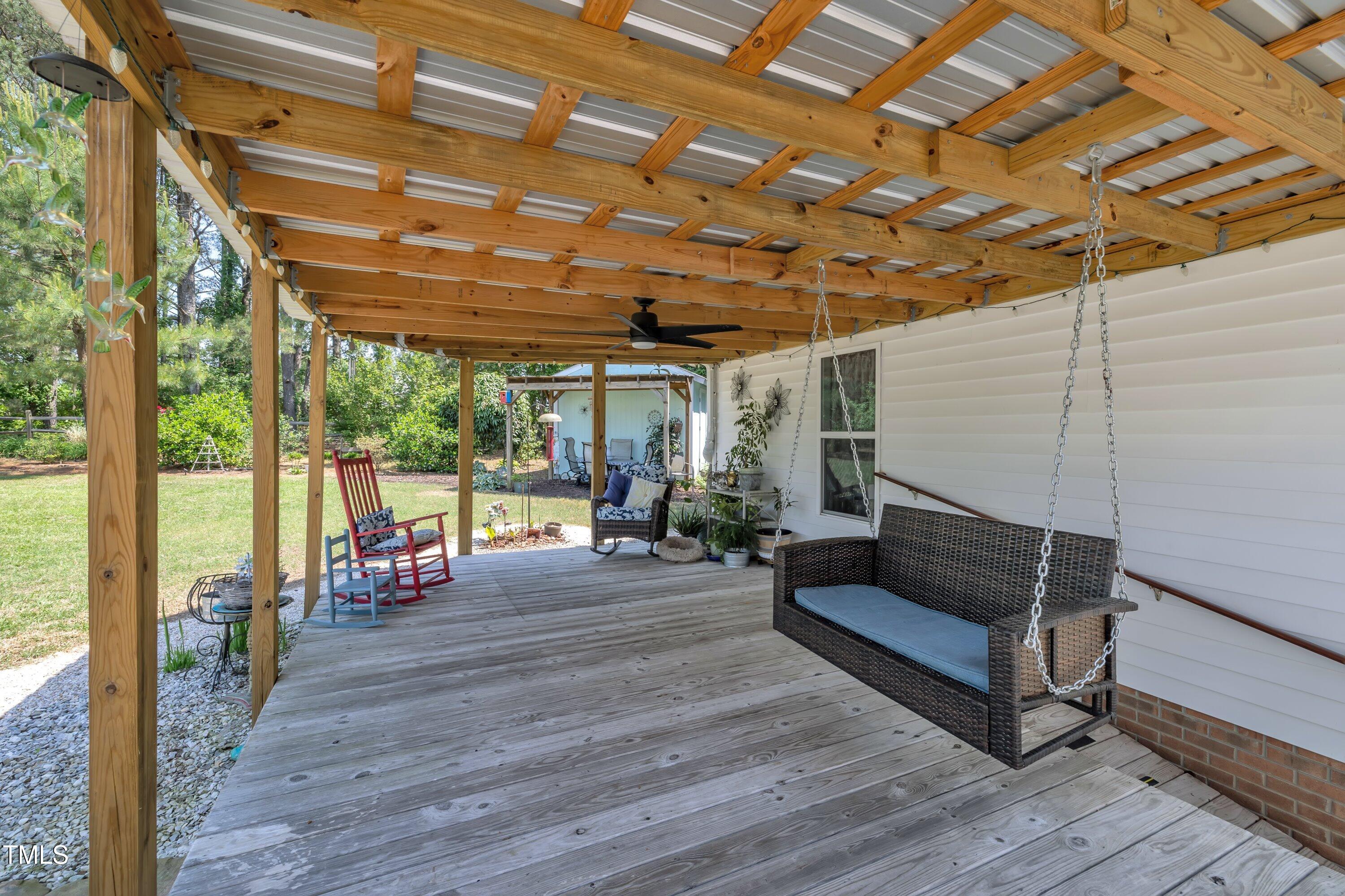 1112 Turner Farms Road Garner, NC 27529 - Photo 37 of 43 a outdoor space with lots of tables and chairs