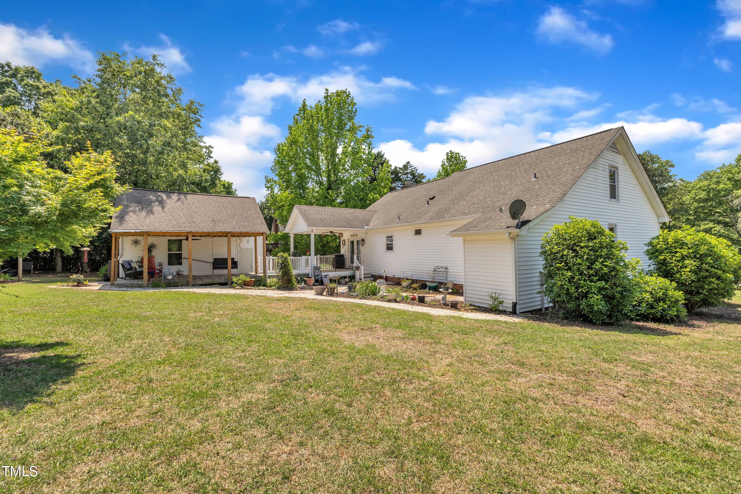 1112 Turner Farms Road Garner, NC 27529 - Photo 39 of 43 a front view of a house with yard and garage