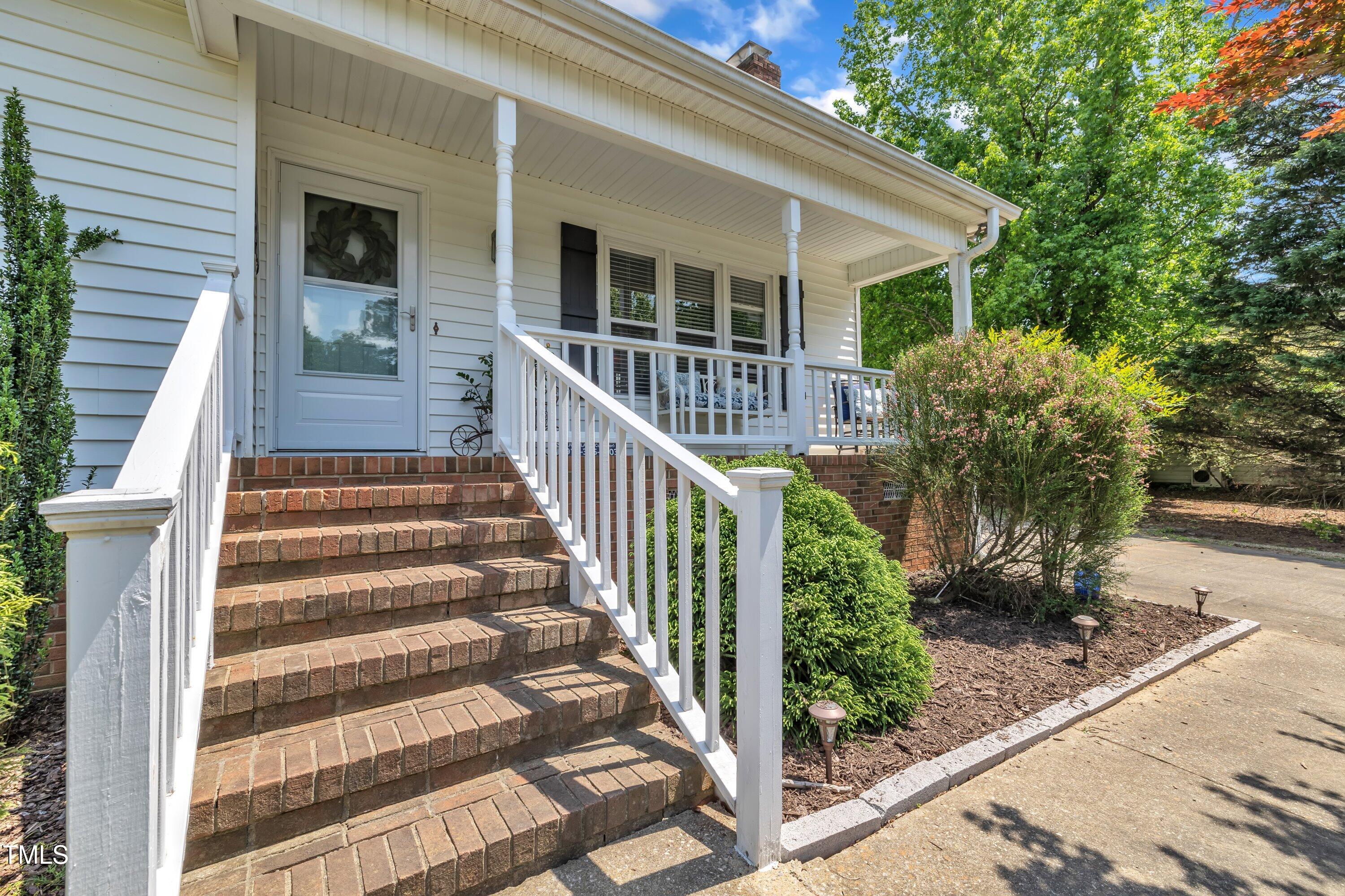 1112 Turner Farms Road Garner, NC 27529 - Photo 6 of 43 a view of a house with backyard and porch