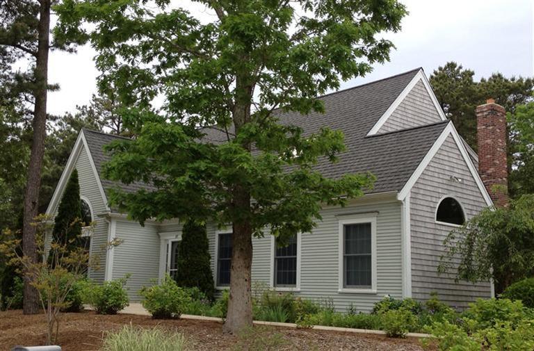 65 River Harbor Road Wellfleet, MA 02667 - Photo 4 of 35 a view of house with a tree in front of it