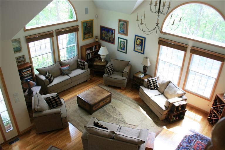65 River Harbor Road Wellfleet, MA 02667 - Photo 8 of 35 a living room with furniture and a large window