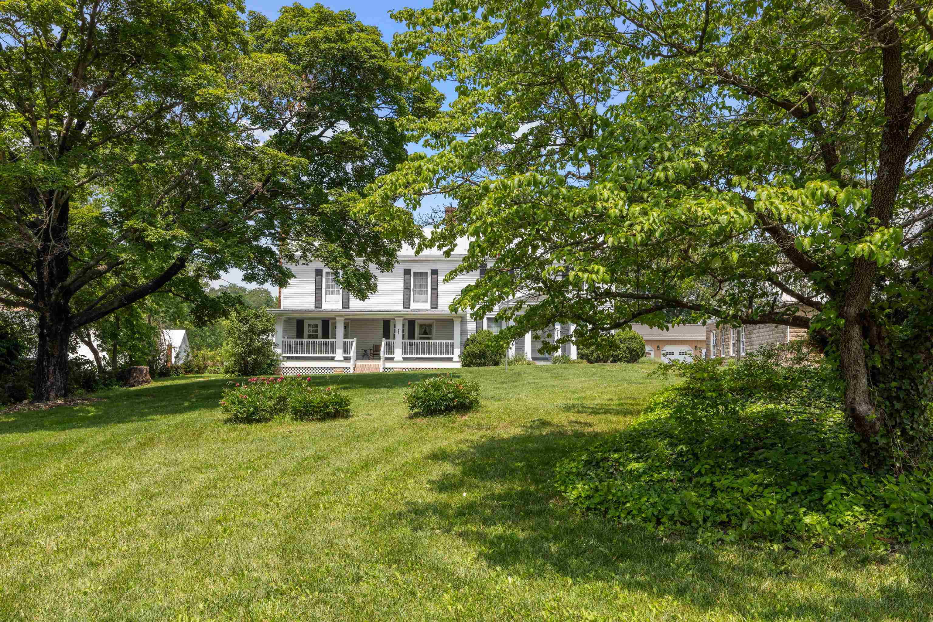 887 Natural Chimney Road Mount Solon, VA 22843 - Photo 54 of 75 a view of a house with a big yard and large trees