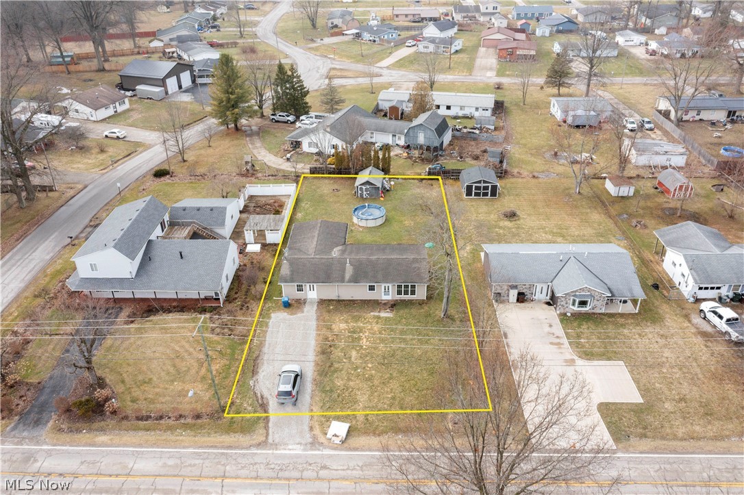 12452 Island Road Grafton, OH 44044 - Photo 3 of 39 Aerial perspective of suburban area featuring property parcel outlined