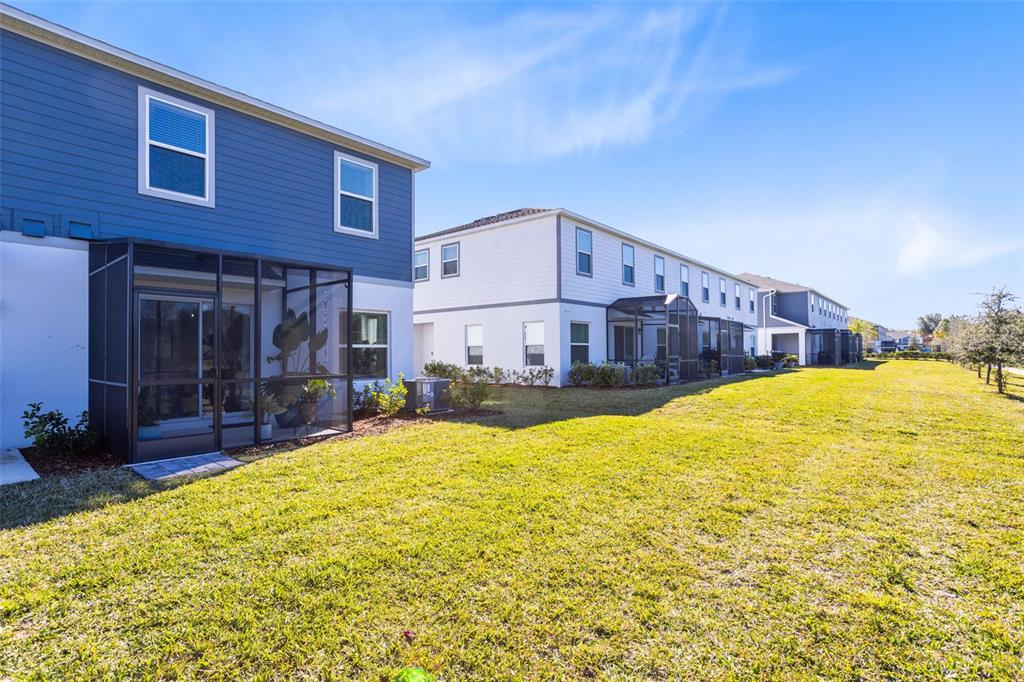 4394 Campsite Loop Orlando, FL 32824 - Photo 31 of 40 a view of a house with a swimming pool