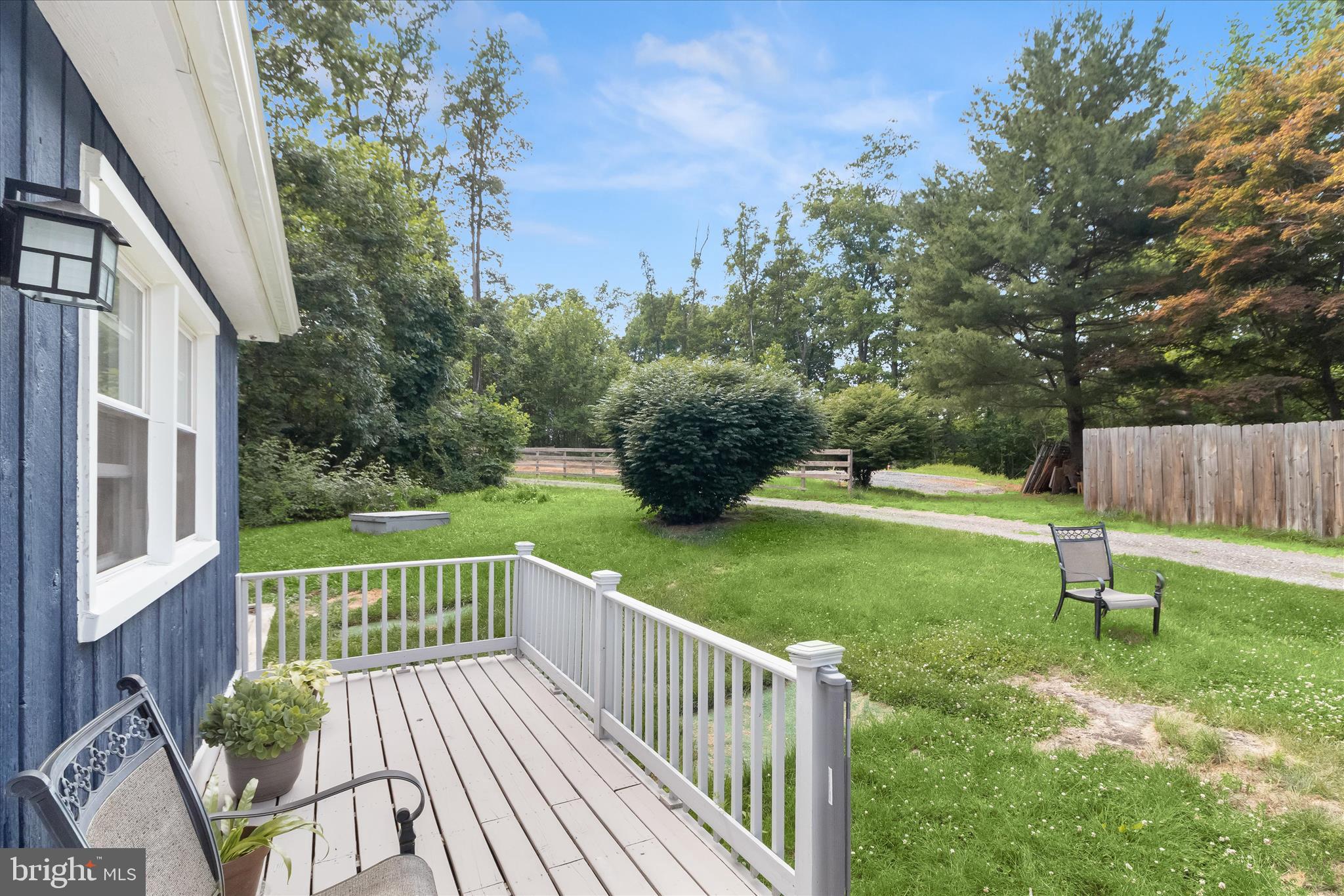 14213 Longnecker Road Reisterstown, MD 21136 - Photo 35 of 44 a view of a house with a backyard and a tree