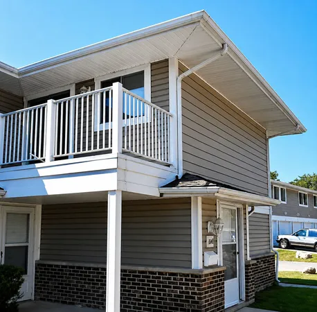 a view of a house with a porch