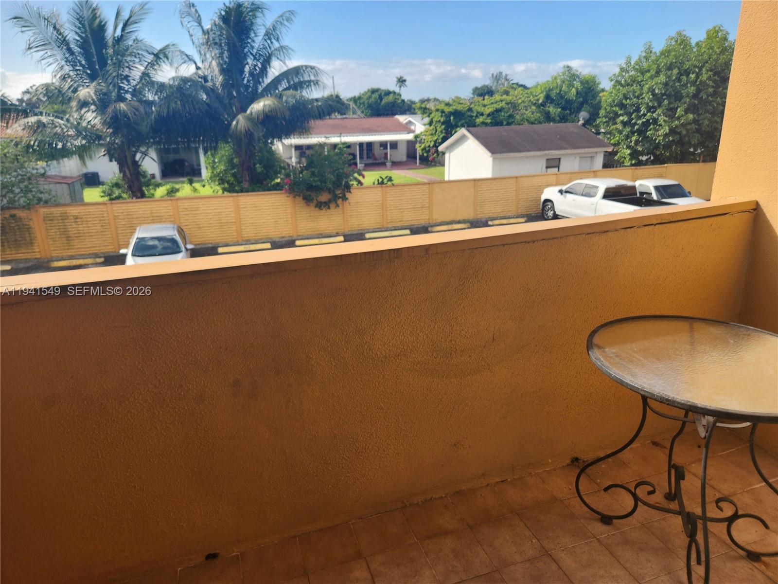 8990 Southwest 24th Street, Unit 228 Miami, FL 33165 - Photo 13 of 17 a view of outdoor space and yard