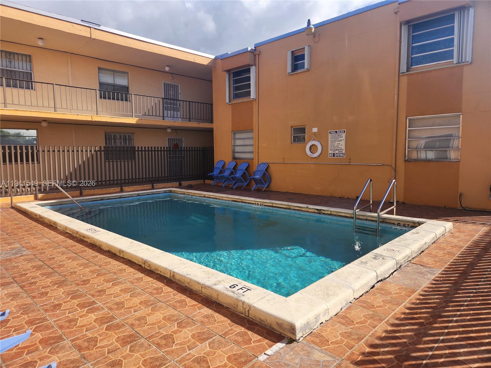 8990 Southwest 24th Street, Unit 228 Miami, FL 33165 - Photo 15 of 17 a view of swimming pool