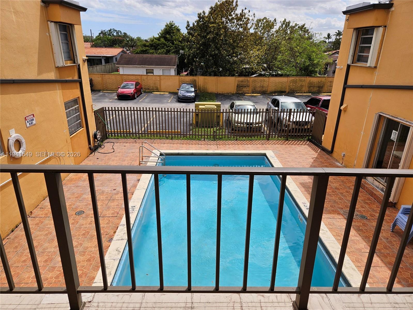 8990 Southwest 24th Street, Unit 228 Miami, FL 33165 - Photo 16 of 20 a outdoor view with sitting space