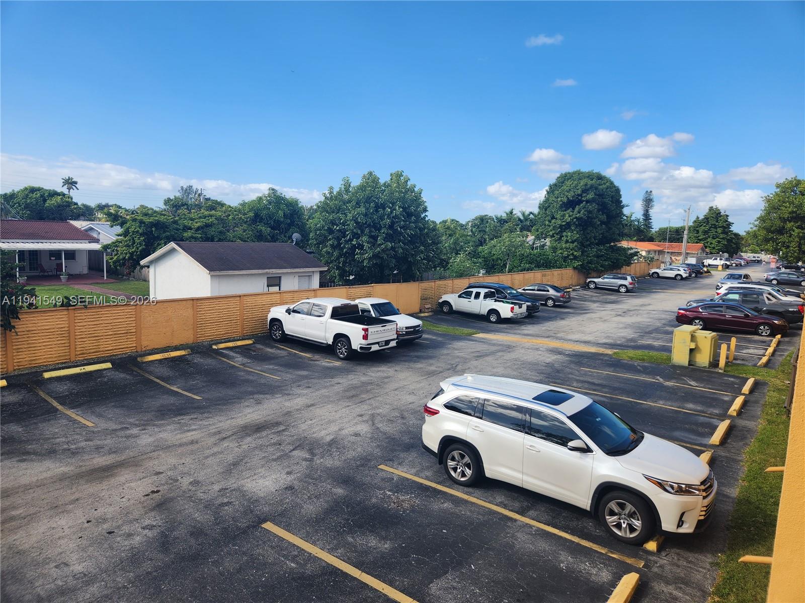 8990 Southwest 24th Street, Unit 228 Miami, FL 33165 - Photo 19 of 20 a view of a street with cars