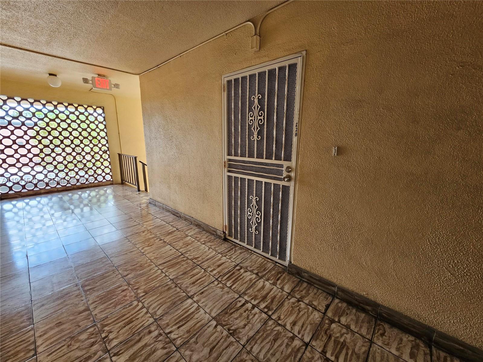 8990 Southwest 24th Street, Unit 228 Miami, FL 33165 - Photo 2 of 20 a view of a garage