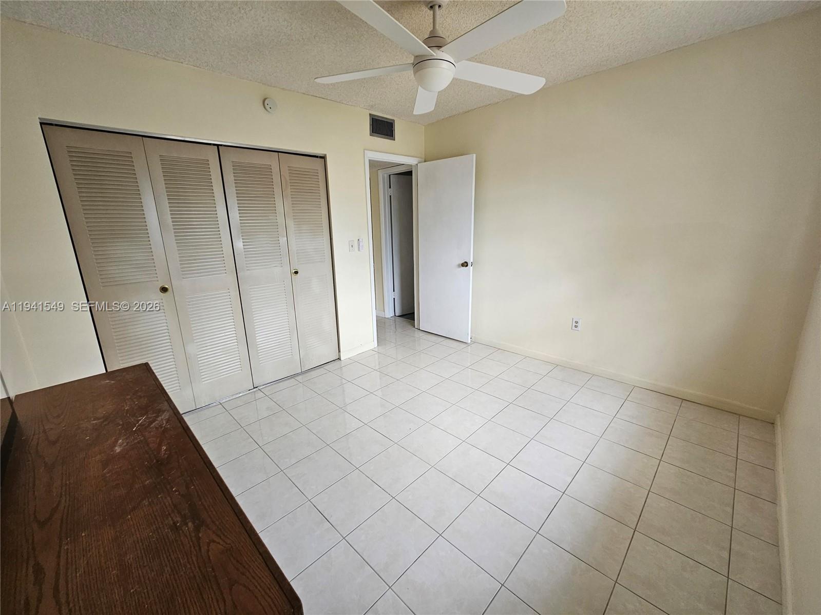 8990 Southwest 24th Street, Unit 228 Miami, FL 33165 - Photo 9 of 20 a view of an empty room