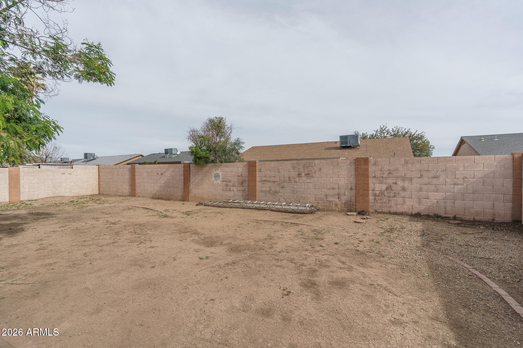 4547 North 87th Avenue Phoenix, AZ 85037 - Photo 19 of 22 a view of a backyard