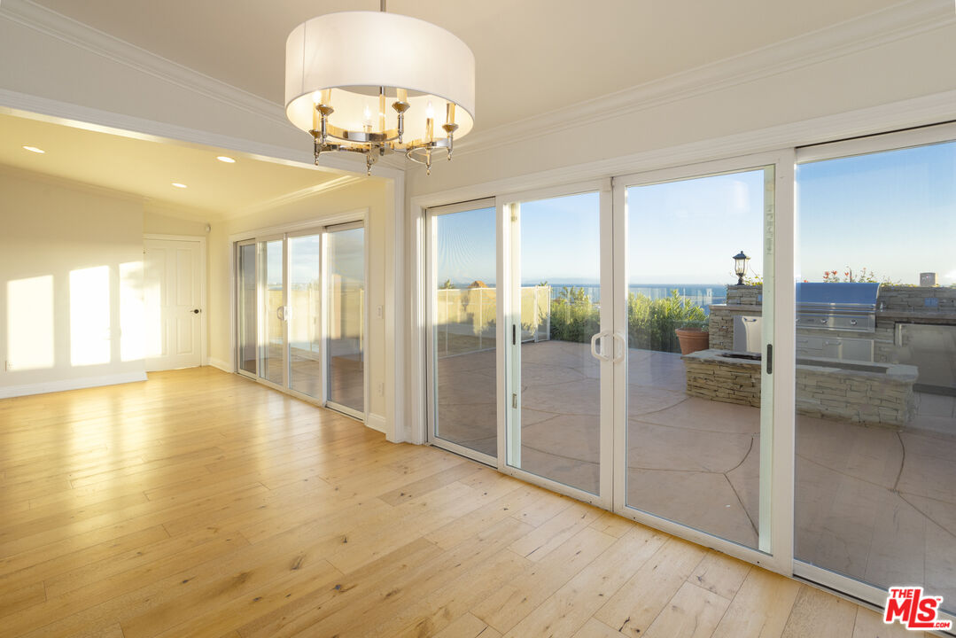 18436 Wakecrest Drive Malibu, CA 90265 - Photo 13 of 41 a view of an entryway with a chandelier