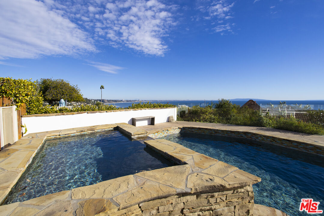 18436 Wakecrest Drive Malibu, CA 90265 - Photo 17 of 41 a view of a balcony with an ocean view