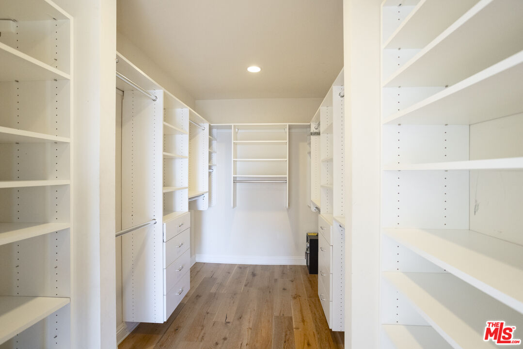 18436 Wakecrest Drive Malibu, CA 90265 - Photo 26 of 41 a view of walk in closet with empty racks