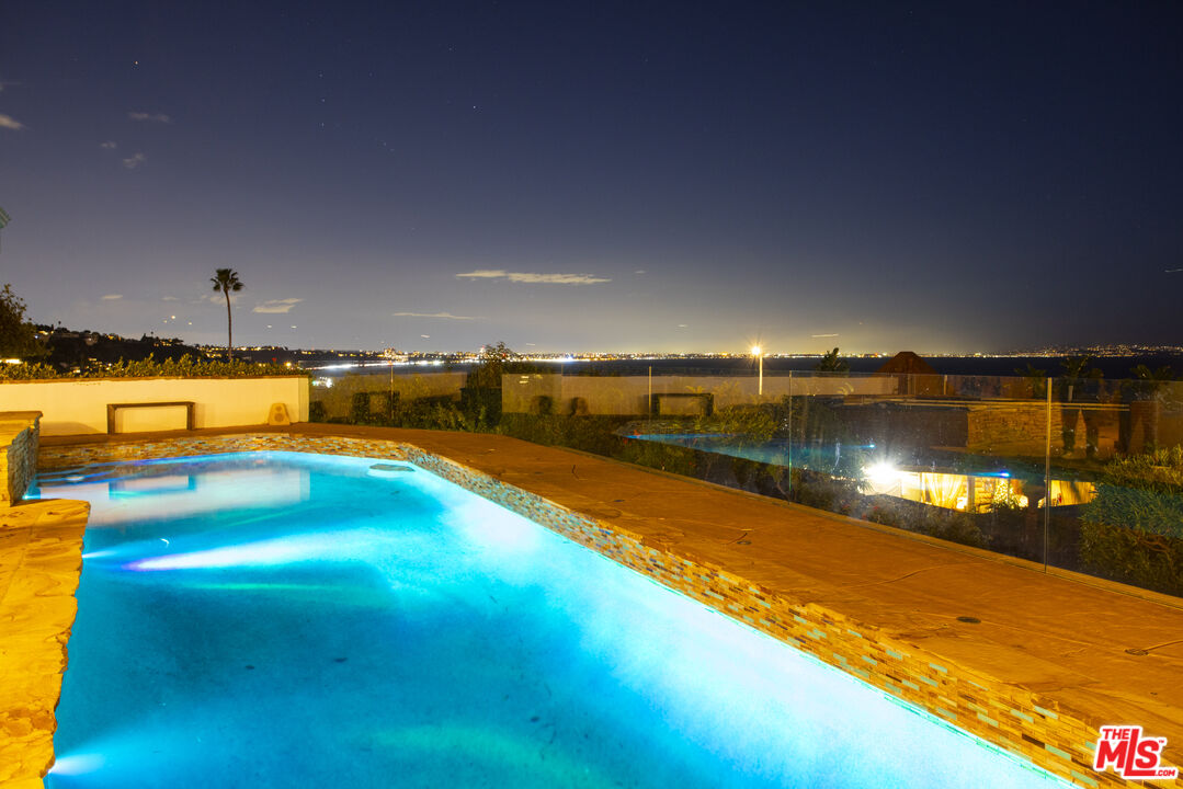 18436 Wakecrest Drive Malibu, CA 90265 - Photo 39 of 41 a view of a swimming pool with an ocean view