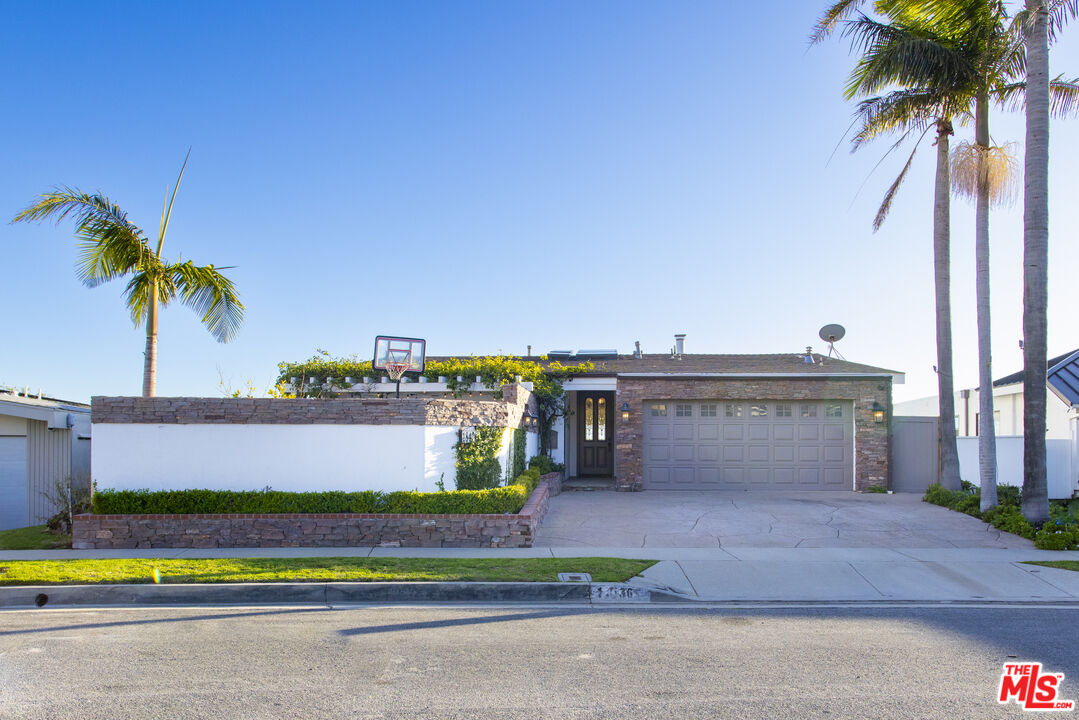 18436 Wakecrest Drive Malibu, CA 90265 - Photo 41 of 41 a view of swimming pool with a yard and palm trees