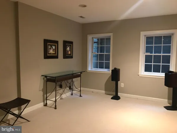 a view of a workspace with furniture