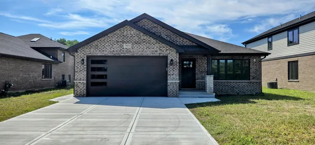 a house view with a garden space