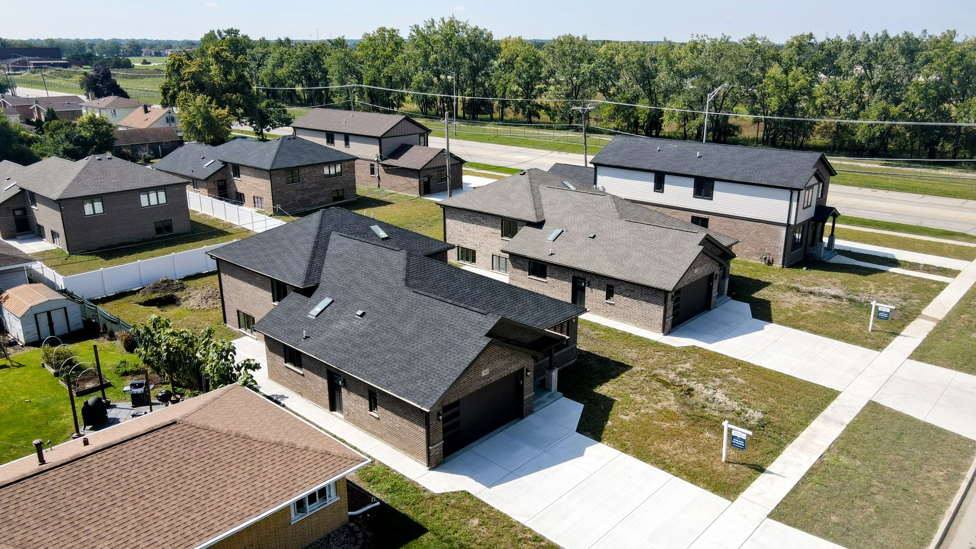 7951 West 73rd Place Bridgeview, IL 60455 - Photo 38 of 41 an aerial view of a house with a garden and lake view