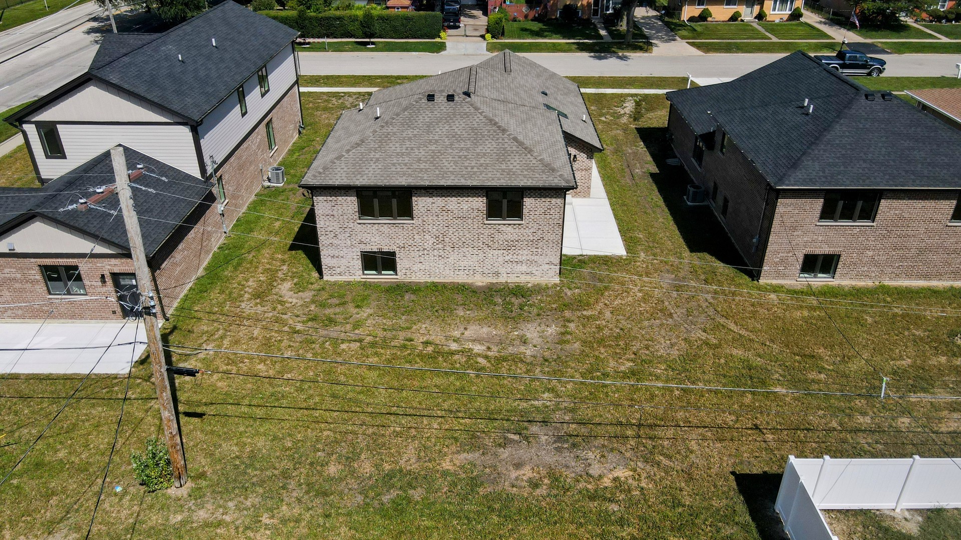 7951 West 73rd Place Bridgeview, IL 60455 - Photo 5 of 41 a aerial view of a house with a yard