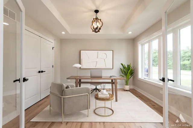 a living room with furniture a chandelier and a window