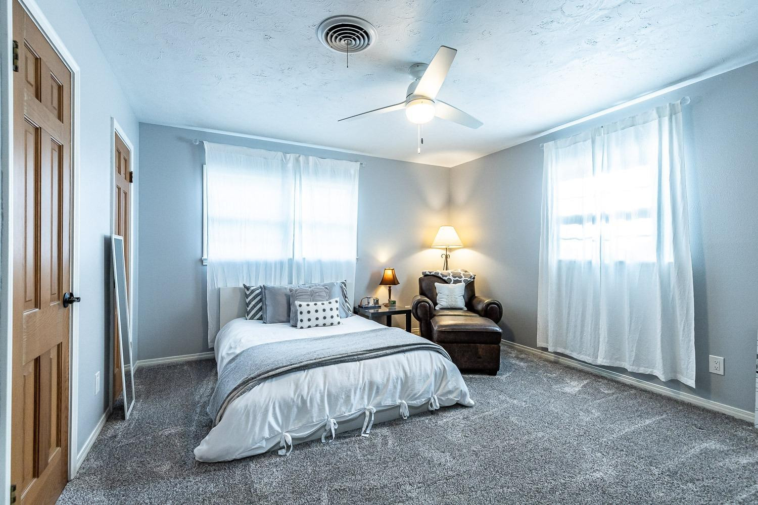 3417 61st Street Lubbock, TX 79413 - Photo 26 of 39 a bedroom with bed and window