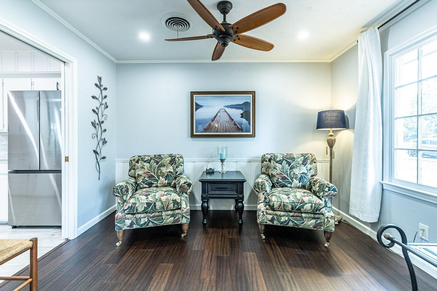3417 61st Street Lubbock, TX 79413 - Photo 6 of 39 a living room with furniture and a large window