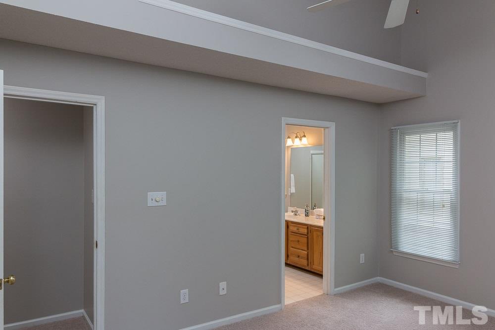 12404 Harcourt Drive Raleigh, NC 27613 - Photo 11 of 22 a view of an empty room and window