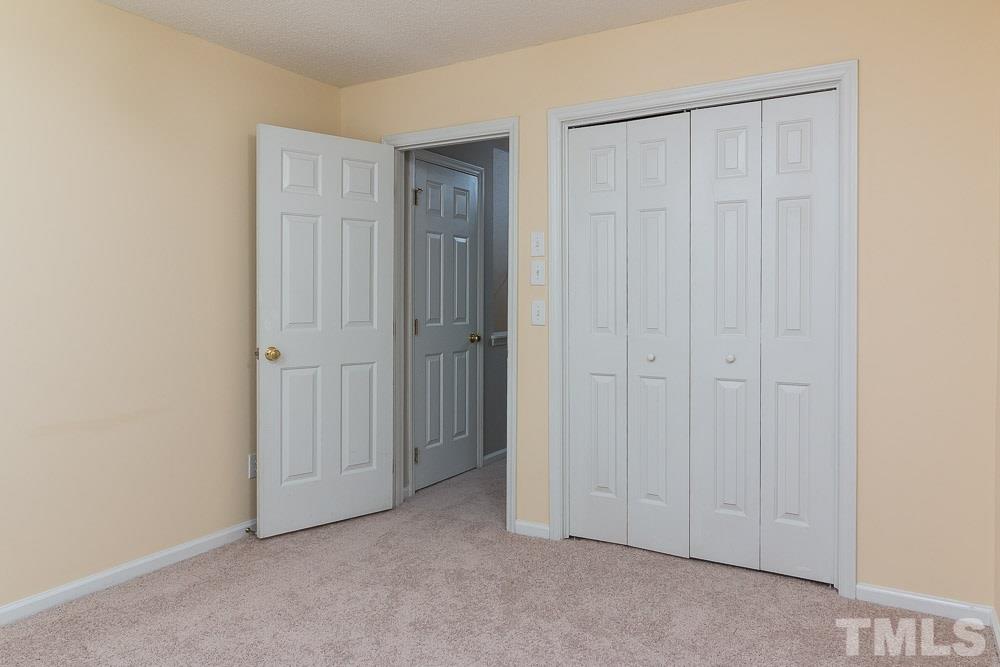 12404 Harcourt Drive Raleigh, NC 27613 - Photo 15 of 22 a view of an empty room with entryway