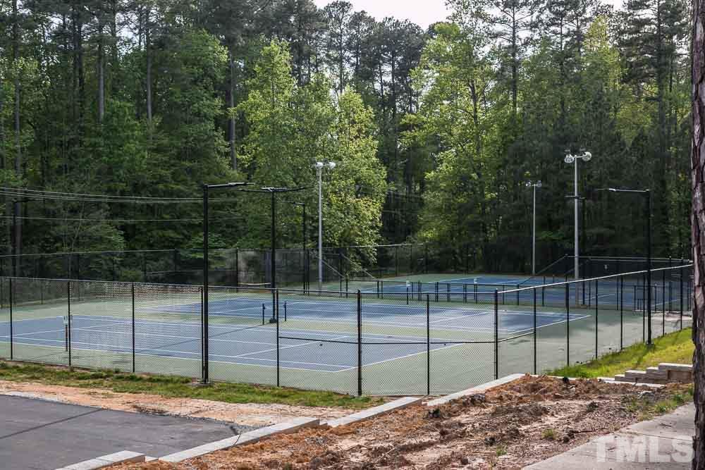 12404 Harcourt Drive Raleigh, NC 27613 - Photo 21 of 22 a view of a backyard