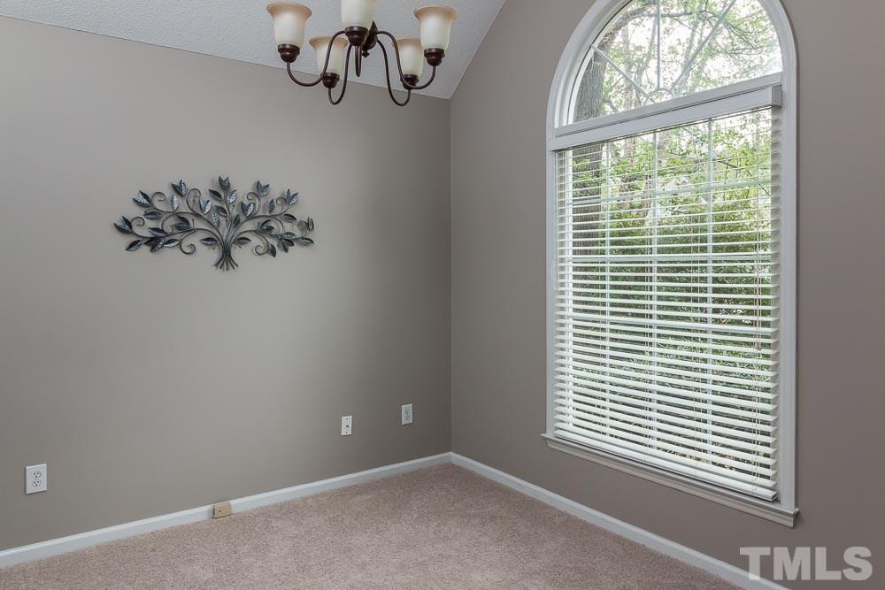 12404 Harcourt Drive Raleigh, NC 27613 - Photo 4 of 22 a view of a window in a room