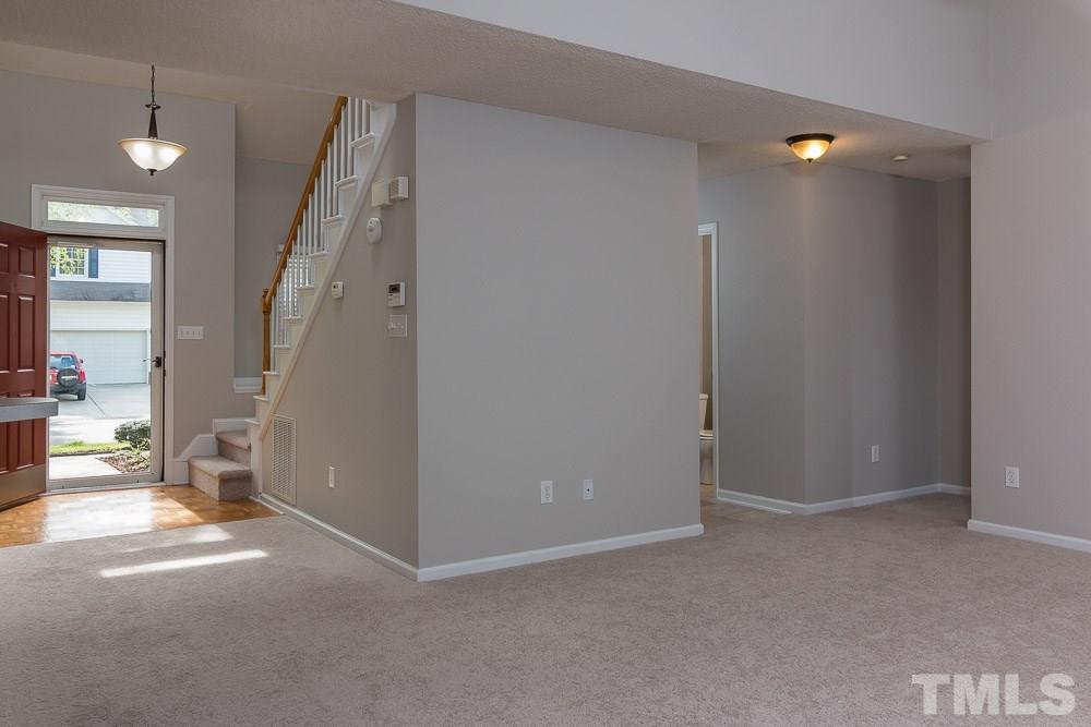 12404 Harcourt Drive Raleigh, NC 27613 - Photo 6 of 22 a view of a livingroom with a fireplace