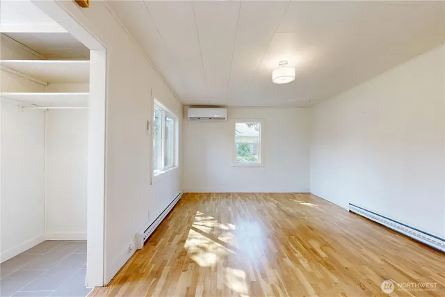 an empty room with windows