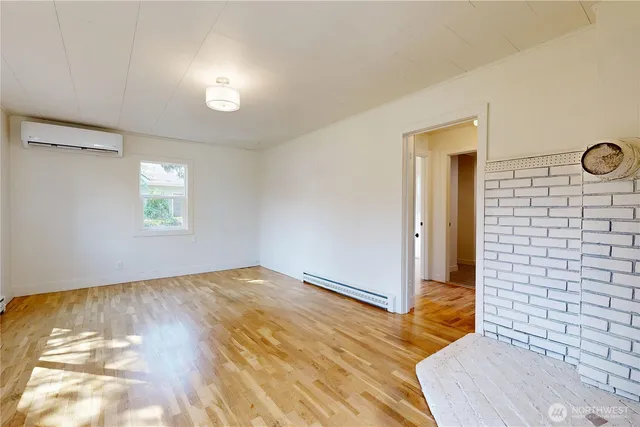 a view of an empty room and window