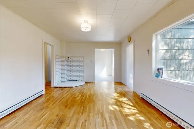 a view of entryway with wooden floor
