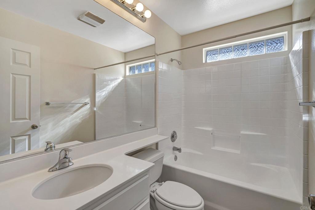 2775 Lobelia Road Alpine, CA 91901 - Photo 19 of 25 a bathroom with a sink toilet and shower