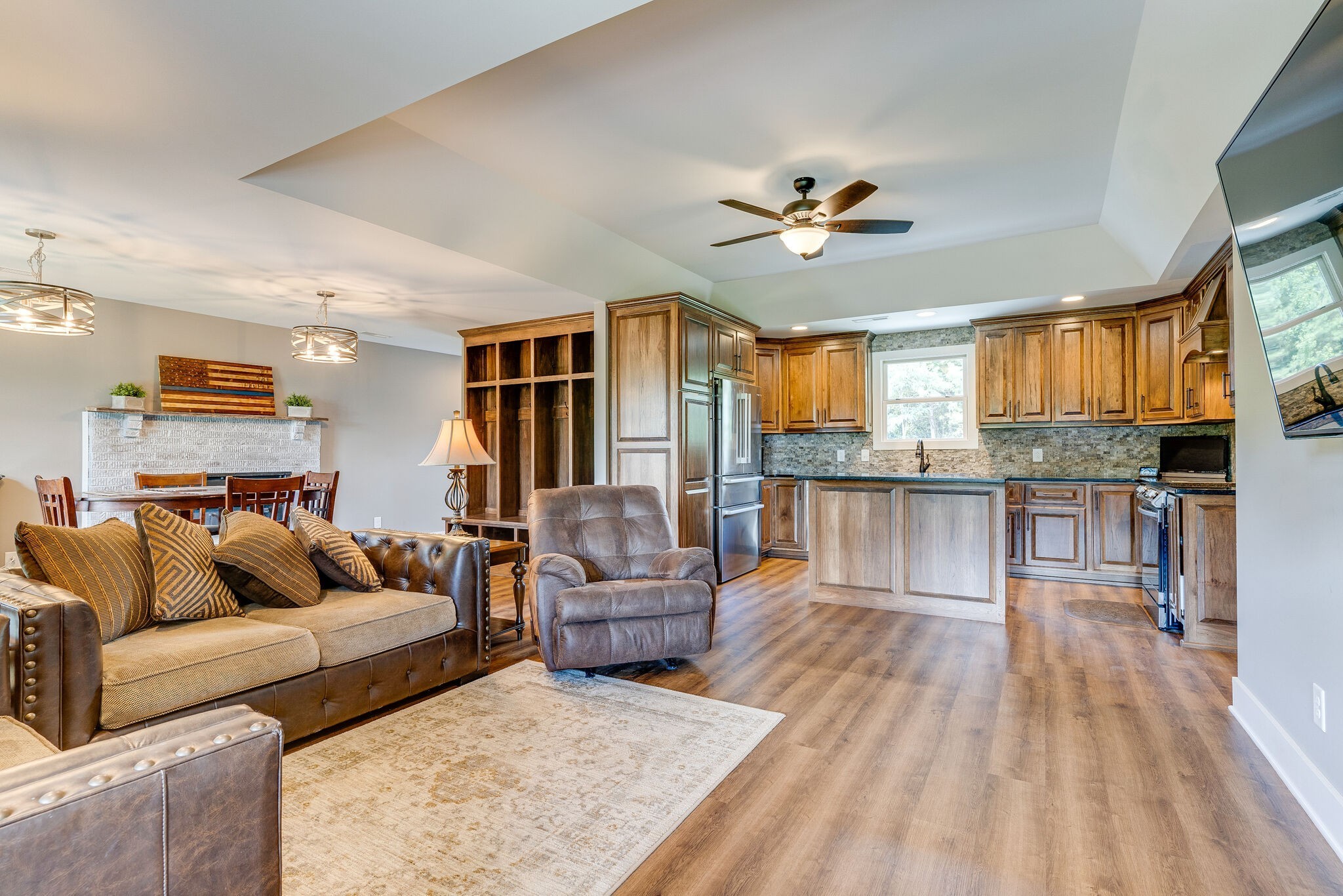 6626 Herbert Shannon Road Springfield, TN 37172 - Photo 5 of 19 a living room with furniture and a large window with kitchen view