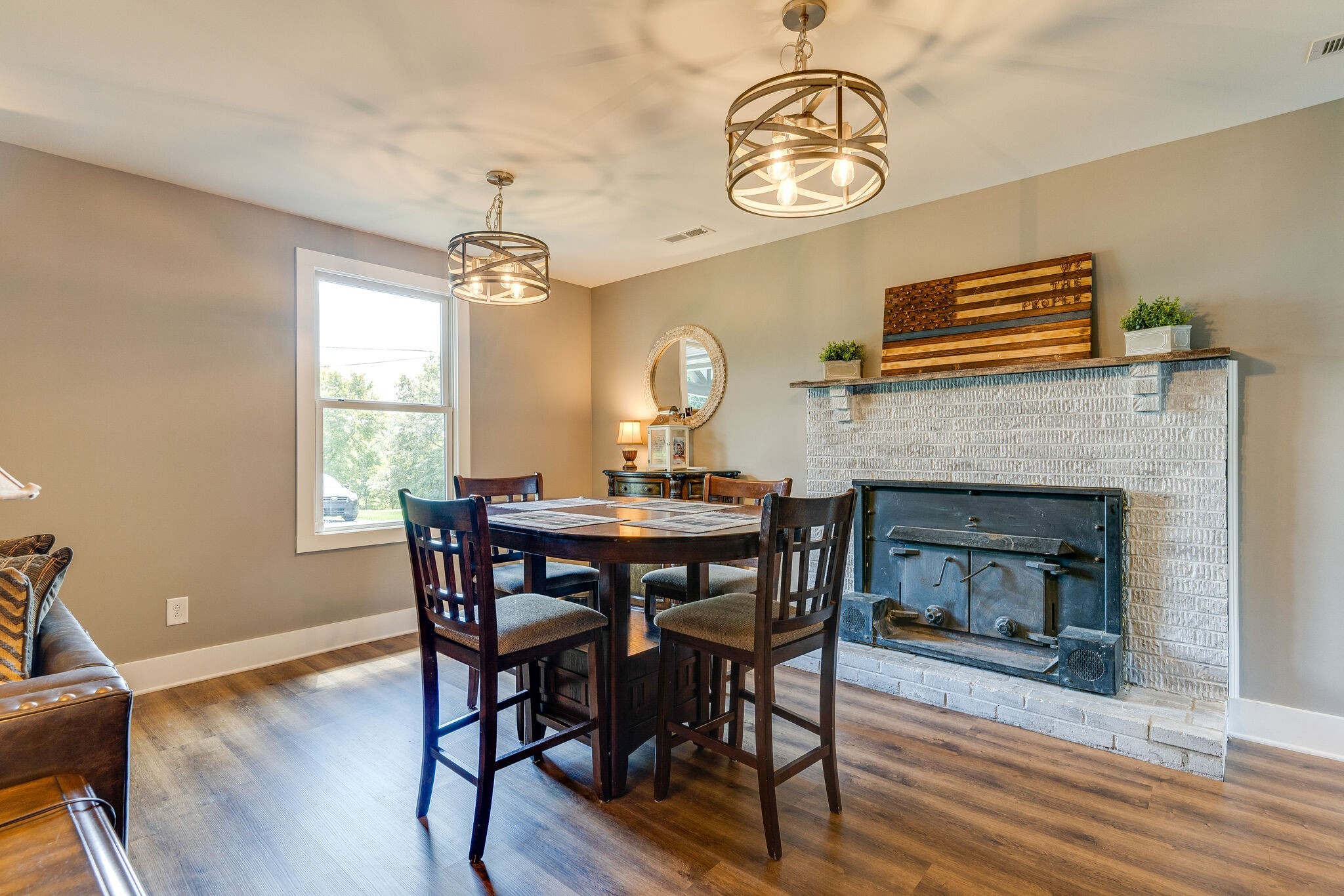 6626 Herbert Shannon Road Springfield, TN 37172 - Photo 7 of 19 a view of a dining room with furniture window and wooden floor