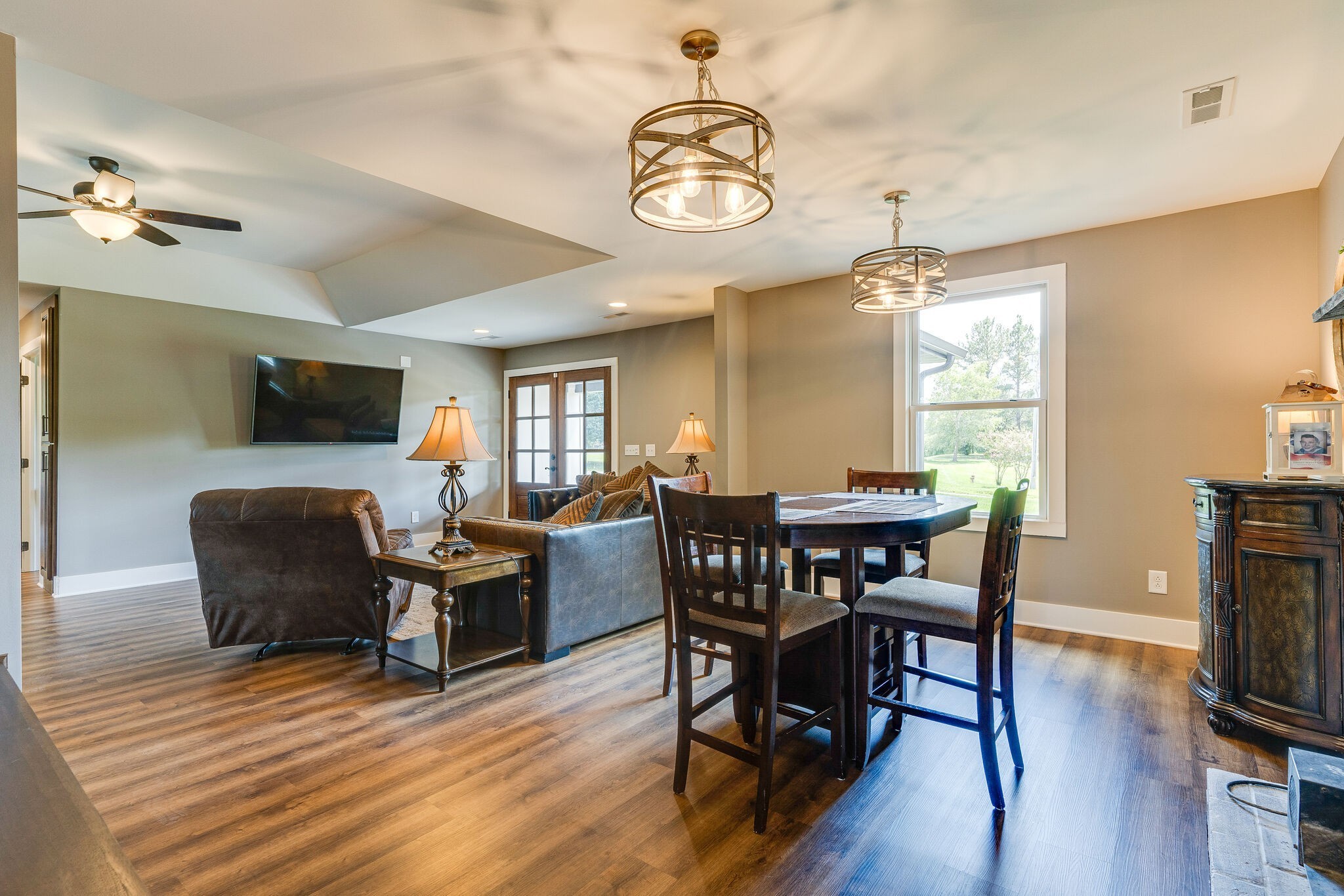 6626 Herbert Shannon Road Springfield, TN 37172 - Photo 9 of 19 a view of a dining room with furniture window and wooden floor