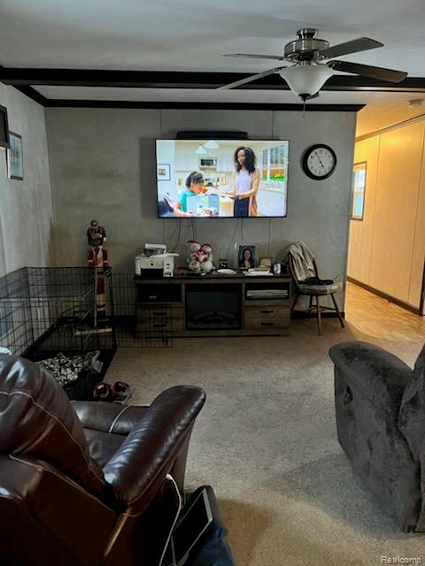 121 Haskin Street Boon, MI 49618 - Photo 2 of 13 Living room featuring a ceiling fan, light carpet, and beamed ceiling