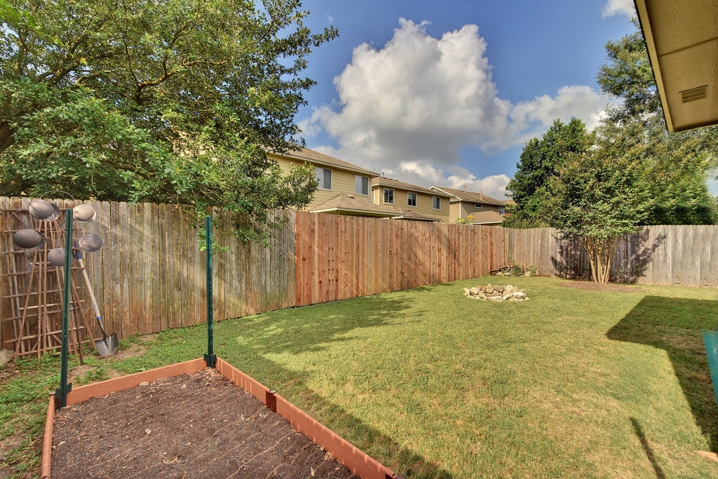 2201 Keepsake Drive Austin, TX 78745 - Photo 25 of 25 a backyard of a house
