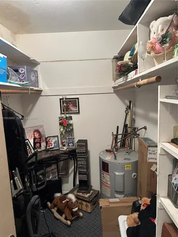 a room with furniture and a chandelier